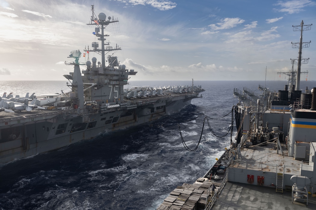 USS Harry S. Truman (CVN 75) replenishes from USNS Arctic (T-AOE 8) in the Atlantic Ocean.