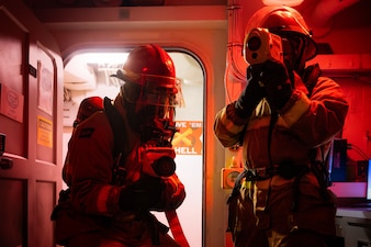 Sailors combat a simulated fire aboard USS Harry S. Truman (CVN 75) in the Atlantic Ocean.