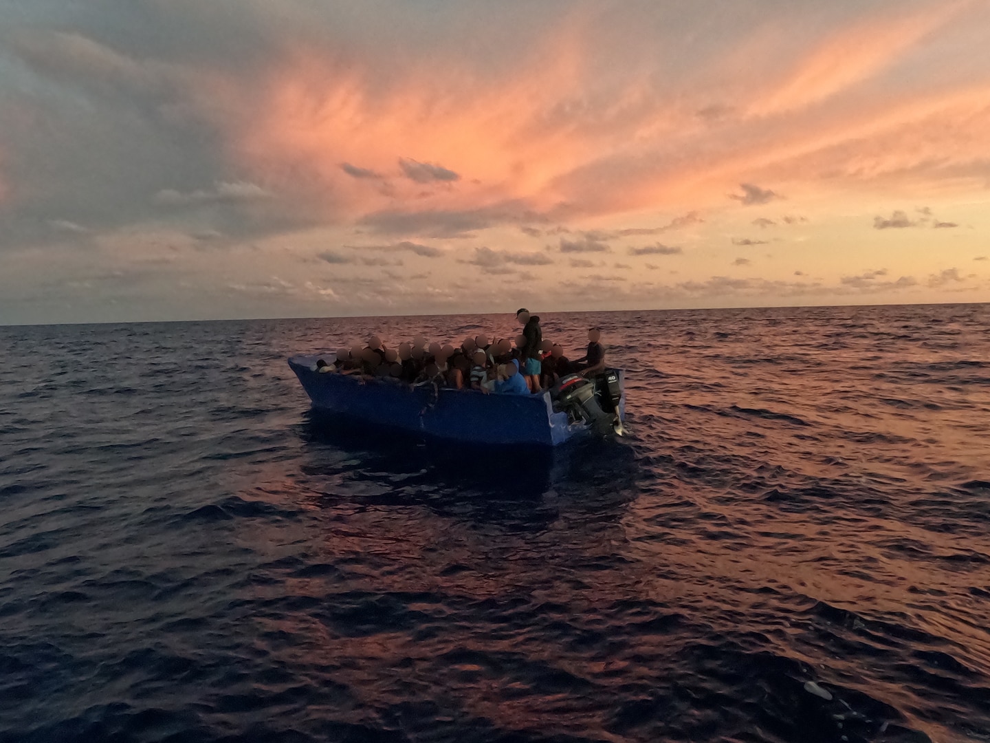 The Coast Guard Cutter Joseph Doyle interdicts an unlawful maritime migration voyage in Mona Passage waters east of Mona Island, Puerto Rico, Oct. 2, 2024.  The migrants were all repatriated at-sea to a Dominican Republic Navy vessel just off Punta Cana, Dominican Republic. (U.S. Coast Guard photo)