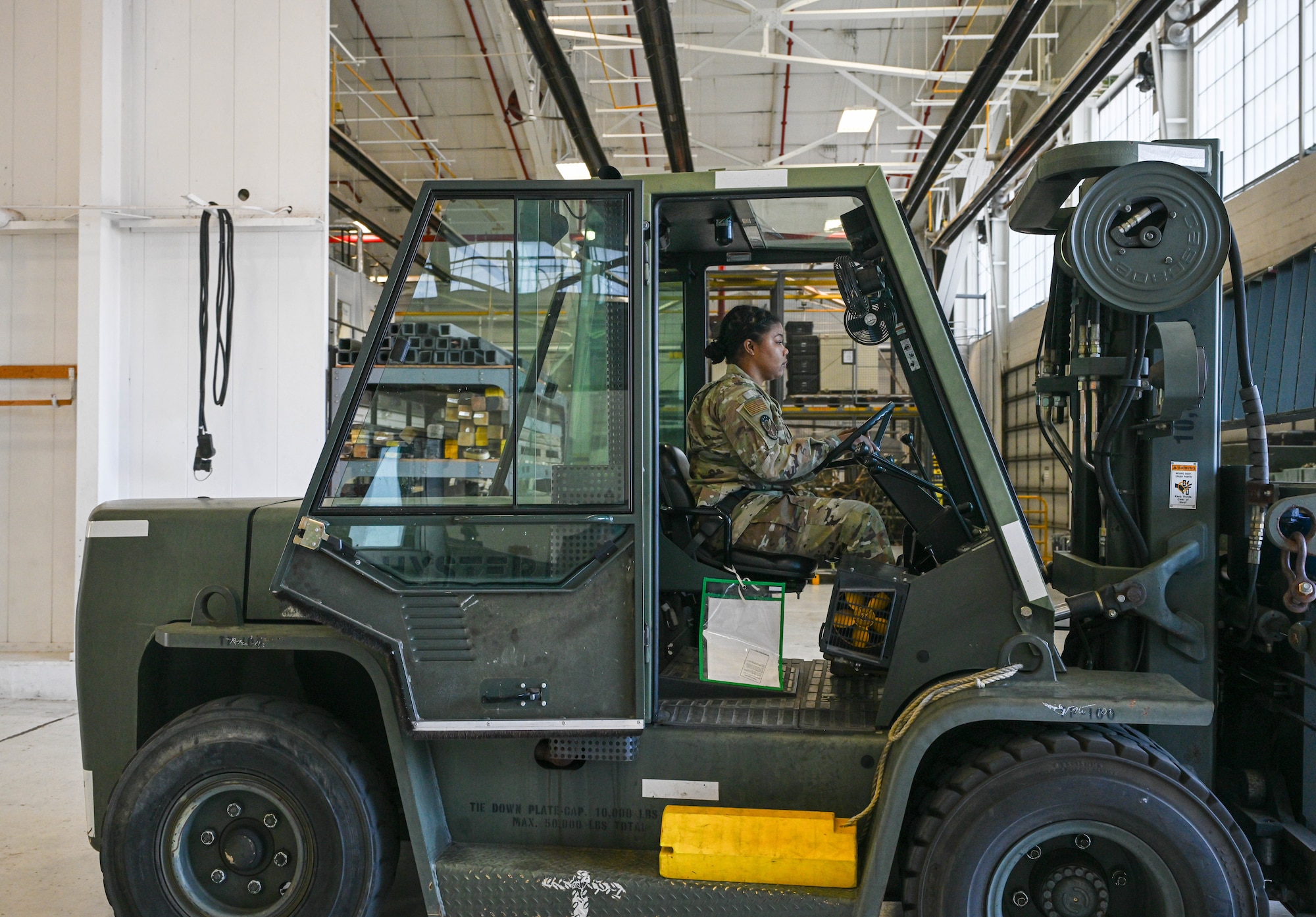 Airman Marlene Ford, an air transportation helper with the 76th Aerial Port Squadron, drives a standard 10K forklift during a training exercise at Youngstown Air Reserve Station, Ohio, Oct. 6, 2024.