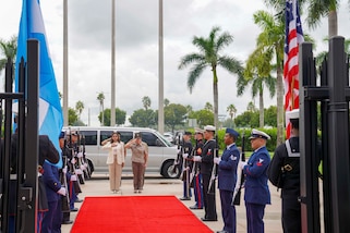 U.S. Army Gen. Laura Richardson, commander of U.S. Southern Command (SOUTHCOM), and Honduran Minister of Defense Rixi Moncada Godoy, walk to the entrance of the command's headquarters as honors are rendered.