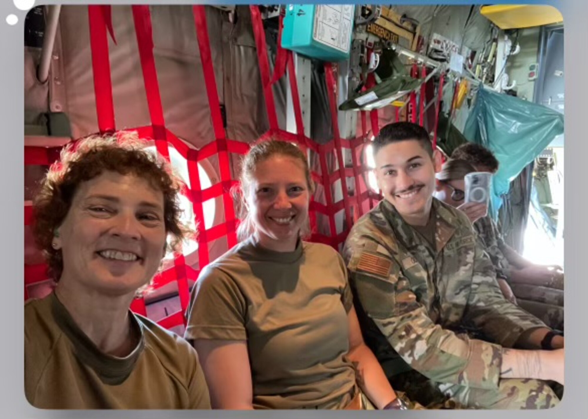 Maj. Debra Triplehorn, 168th Medical Group physician, takes a selfie of the 168th Medical team while traveling to Saipan via military aircraft to provide medical care in the Northern Mariana Islands.