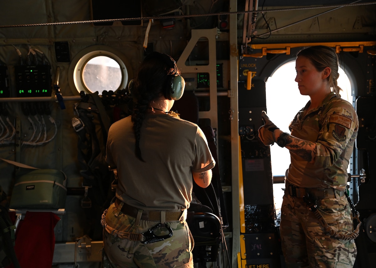 U.S. Air Force Airman 1st Class Jocelyn Lopez, 79th Rescue Squadron loadmaster, forward deployed in the 563rd Personnel Recovery Task Force, left, checks in with Staff Sgt. Logan Dominguez 563rd Operations Support Squadron weapons and tactics loadmaster, right, at McGhee Tyson Air National Guard Base, Tennessee, Oct. 3, 2024, in support of the U.S. Northern Command and Air Forces Northern, Defense Support of Civil Authorities Disaster Relief mission. USNORTHCOM’s support of lead federal agencies in the aftermath of a natural disaster remains a core mission that directly bolsters our homeland defense enterprise, while delivering rapid relief to American citizens in times of great need. (U.S. Air Force photo by Staff Sgt. Abbey Rieves)