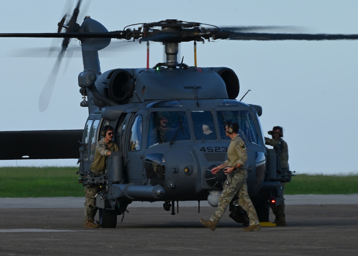 U.S. Airmen assigned to the 55th Rescue Generation Squadron, forward deployed as the 563rd Personnel Recovery Task Force, conduct preflight checks at McGhee Tyson Air National Guard Base, Tennessee, Oct. 3, 2024, in support of the U.S. Northern Command and Air Forces Northern, Defense Support of Civil Authorities Disaster Relief mission. Davis-Monthan Air Force Base’s rescue assets were tasked with rescue and recovery operations for residents impacted by Hurricane Helene. (U.S. Air Force photo by Staff Sgt. Abbey Rieves)