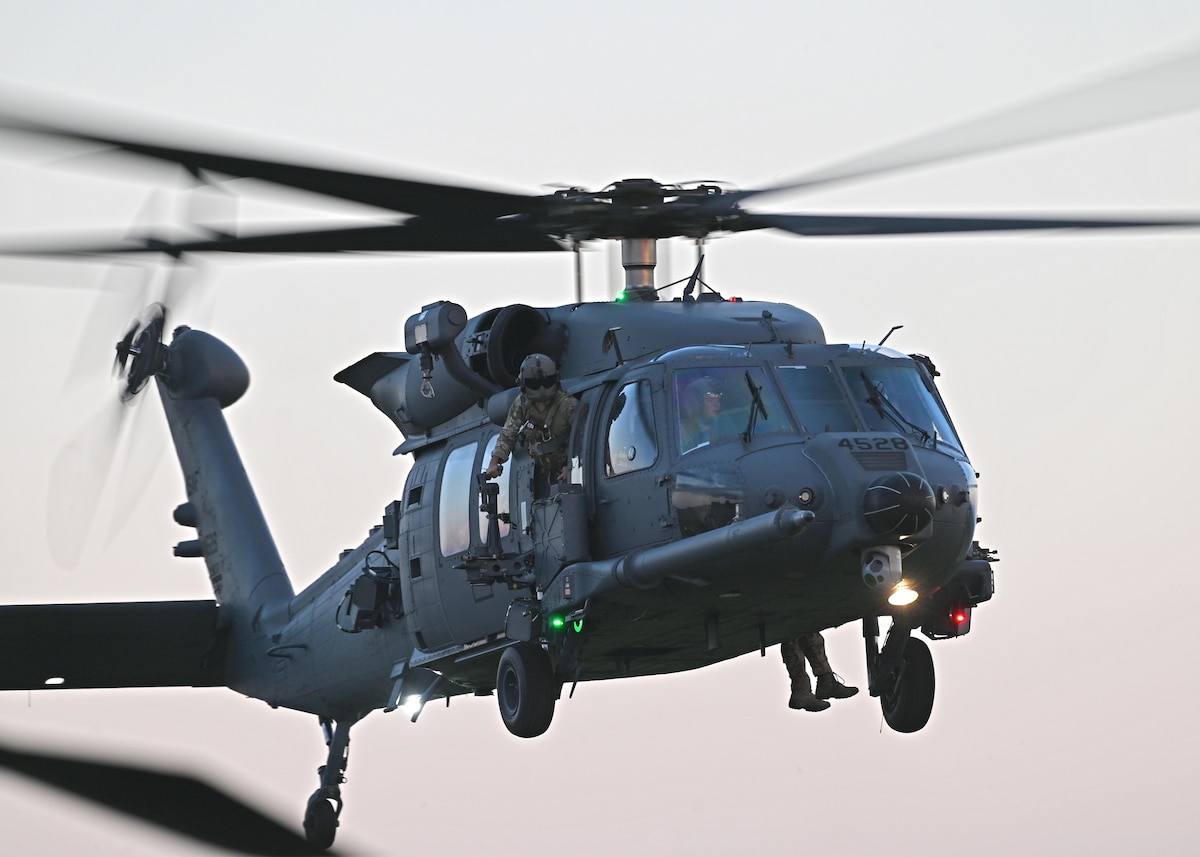 U.S. Air Force Airman 1st Class Brandon Barrera, 55th Rescue Squadron special mission aviator, forward deployed as the 563rd Personnel Recovery Task Force, prepares to land at McGhee Tyson Air National Guard Base, Tennessee, Oct. 2, 2024, in support of the U.S. Northern Command and Air Forces Northern, Defense Support of Civil Authorities Disaster Relief mission. USNORTHCOM works year-round with federal, state, local, tribal, and territorial partners to ensure plans, communications, and interagency relationships are always ready to support our lead federal agencies to deliver the right military-unique capabilities at the right time and place. (U.S. Air Force photo by Staff Sgt. Abbey Rieves)