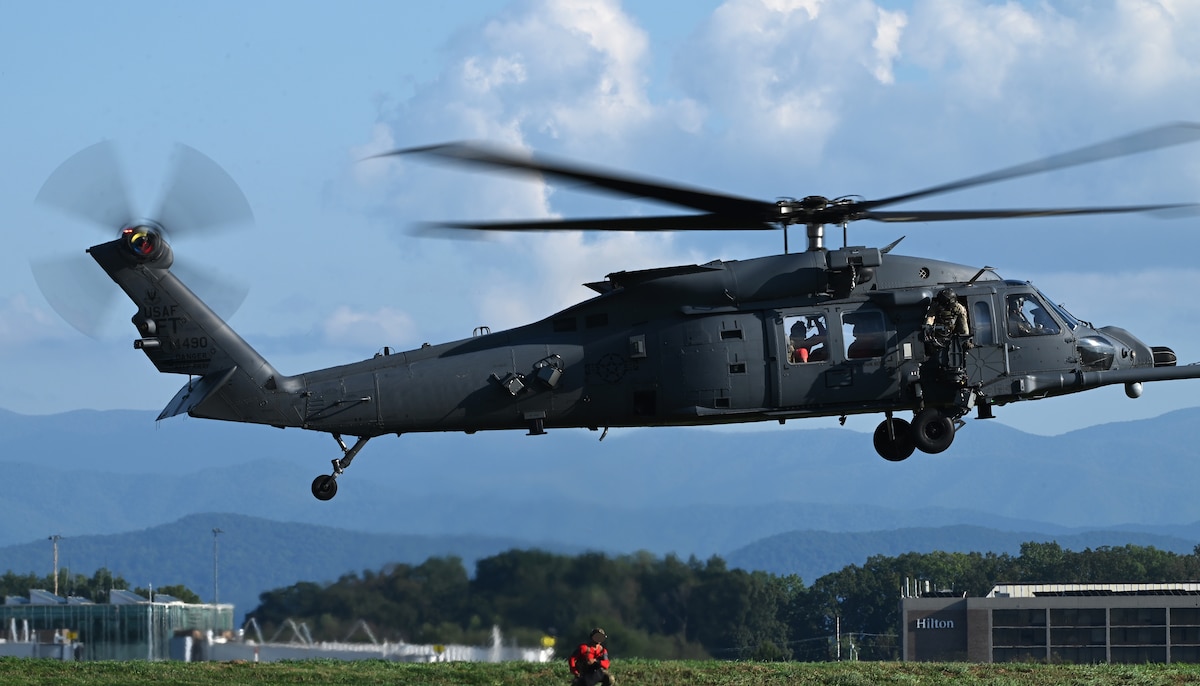 An HH-60W Jolly Green II helicopter assigned to the 55th Rescue Squadron, forward deployed as the 563rd Personnel Recovery Task Force, trains at McGhee Tyson Air National Guard Base, Tennessee, Oct. 2, 2024, in support of the U.S. Northern Command and Air Forces Northern, Defense Support of Civil Authorities Disaster Relief mission. USNORTHCOM’s support of lead federal agencies in the aftermath of a natural disaster remains a core mission that directly bolsters our homeland defense enterprise, while delivering rapid relief to American citizens in times of great need. (U.S. Air Force photo by Staff Sgt. Abbey Rieves)