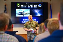 U.S. Air Force Lt. Col. Ronald Feeser, 5th Bomb Wing (5BW) chaplain, delivers a speech during the 5 BW Chaplain Corps Clergy Day tour at Minot Air Force Base, North Dakota, Oct. 2, 2024. Feeser spoke to local religious leaders about the importance of their impact on Airmen.