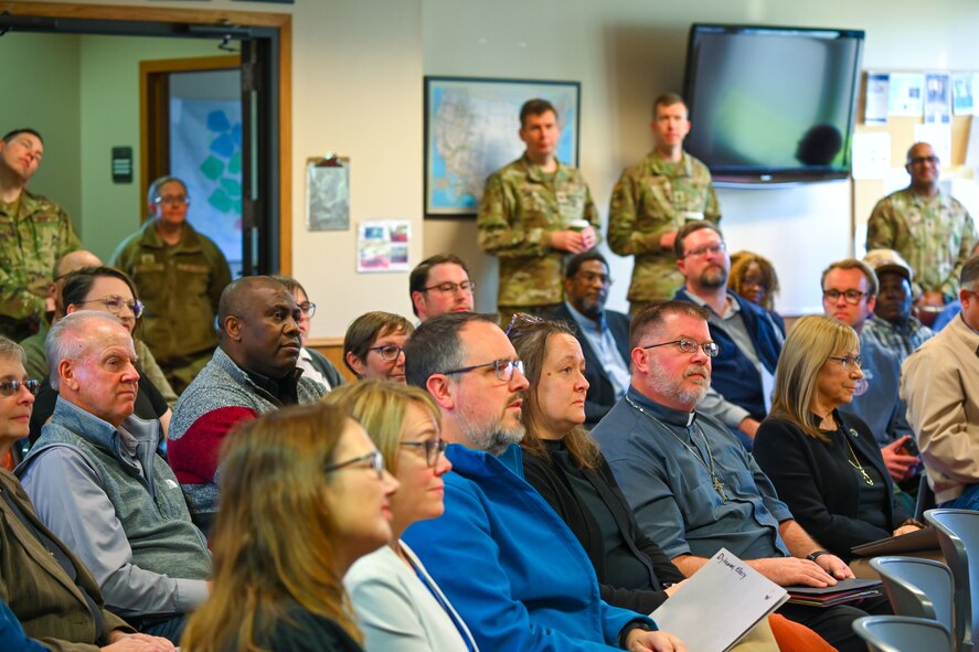 City of Minot religious leaders attend a combined mission brief at Minot Air Force Base, North Dakota, Oct. 2, 2024. Local religious leaders visited the base for the first-ever 5th Bomb Wing Chaplain Corps Clergy Day tour. The tour gave local religious leaders a better understanding of the mission at Minot Air Force Base and how spiritual resiliency can benefit Airmen.