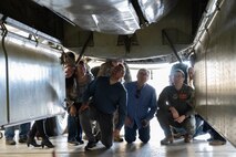 Local religious leaders visit a B52 Bomber as part of the 5 BW Chaplain Corps Clergy Day tour at Minot Air Force Base, North Dakota, Oct. 2, 2024. The tour gave local religious leaders a better understanding of the mission at Minot Air Force Base and how spiritual resiliency can benefit Airmen.