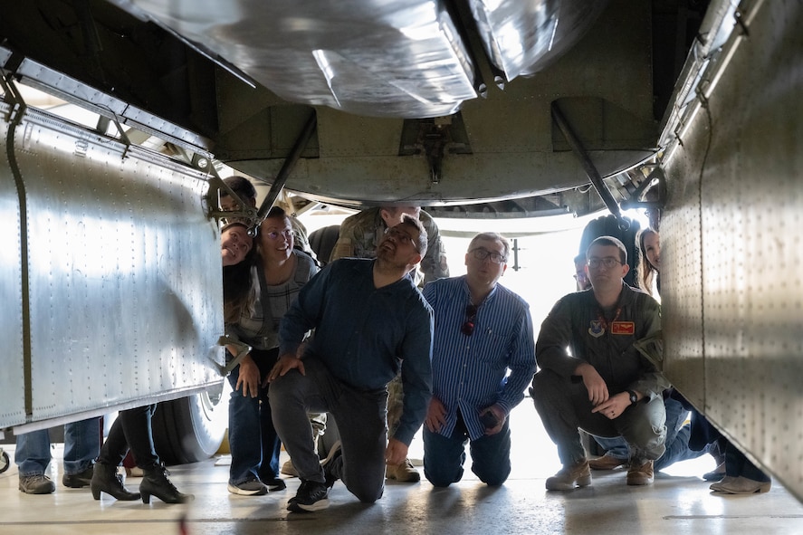 Local religious leaders visit a B52 Bomber as part of the 5 BW Chaplain Corps Clergy Day tour at Minot Air Force Base, North Dakota, Oct. 2, 2024. The tour gave local religious leaders a better understanding of the mission at Minot Air Force Base and how spiritual resiliency can benefit Airmen.