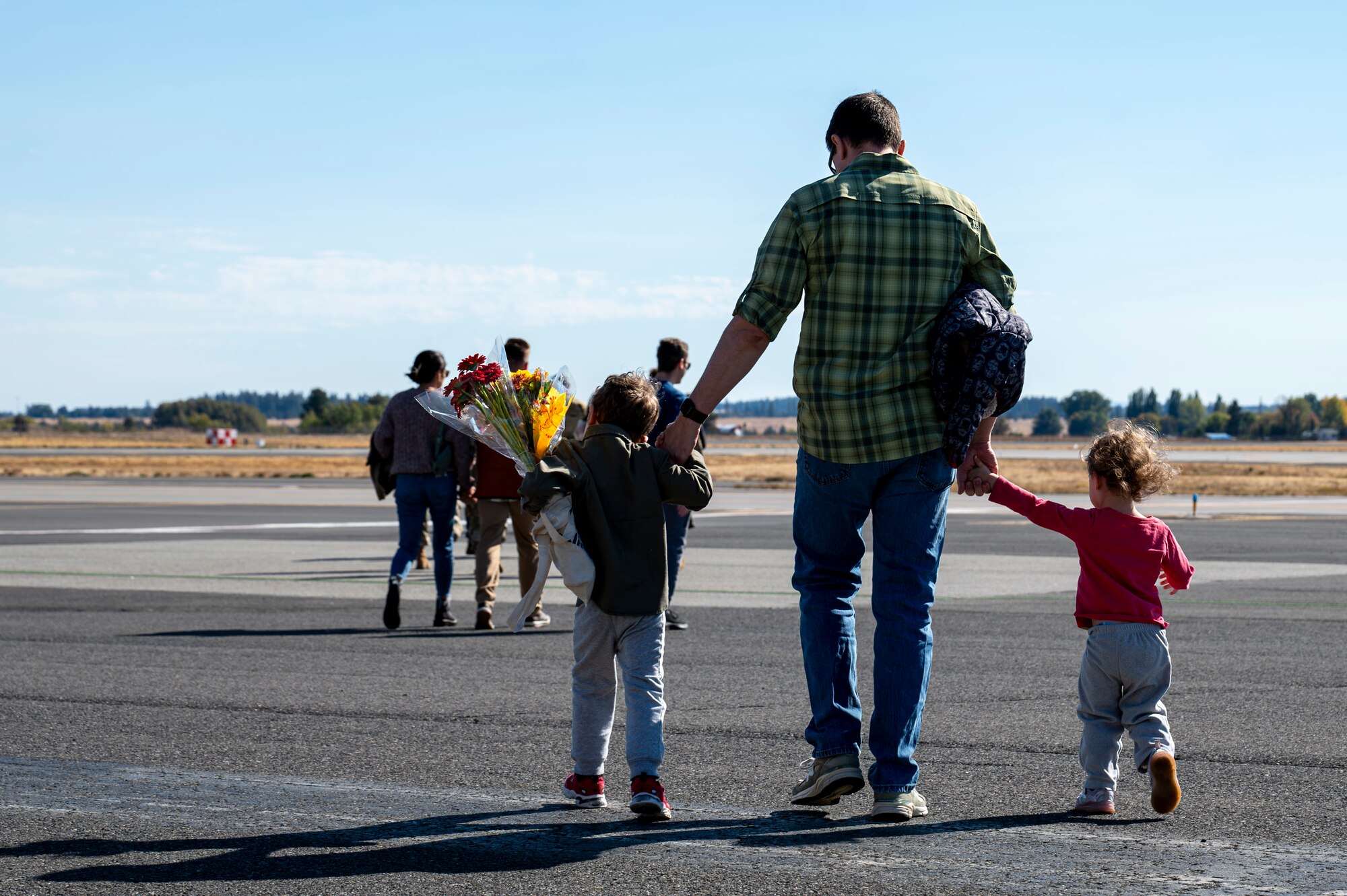 Family wait to greet deployed Airmen