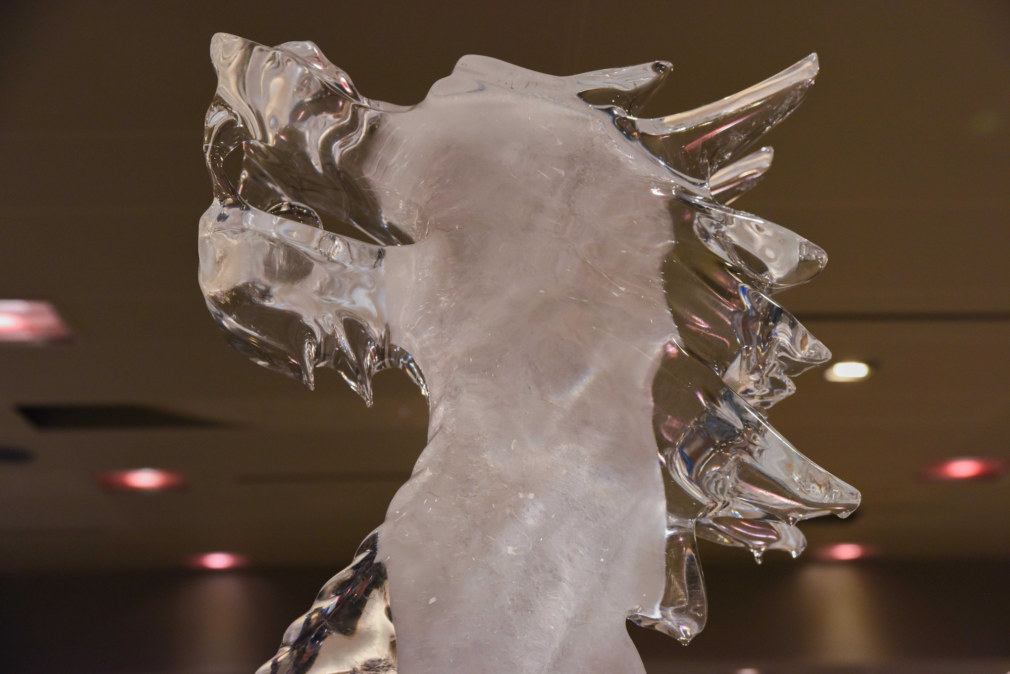 A dragon shaped ice sculpture stands tall between the U.S. and South Korean national flags outside the Vista Hall ballroom at the Grand Walkerhill Hotel in Seoul, Republic of Korea, Oct. 4, 2024. The sculpture pays homage to the theme of 7th AF’s Peninsula Wide AF Ball, Year of the Blue Dragon: Strength, Prosperity, and Success. More than 900 service members across the ROK peninsula, as well as community partners, gathered to celebrate the AF’s 77th birthday. (U.S. Air Force photo by Staff Sgt. Kahdija Slaughter)