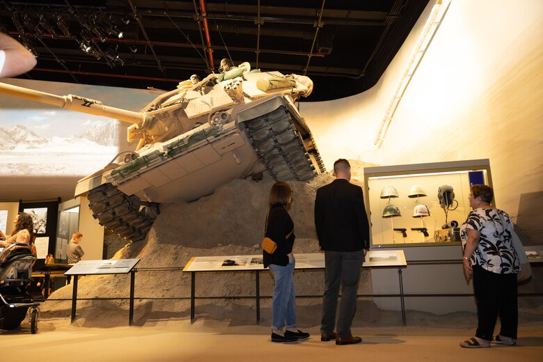 Civilians look at displays at the National Museum of the Marine Corps in Triangle, VA, Oct 6, 2024. 2024.  The National Museum of the Marine Corps opened the new Forward Deployed and Iraq & Afghanistan galleries to the public.