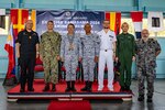 Rear Adm. Todd Cimicata, Commander, Logistics Group Western Pacific/Task Force 73 (COMLOG WESTPAC/CTF 73) (left) poses for a photo with Rear Adm. Jose Ma Ambrosio Q. Ezpeleta, Vice Commander, Philippine Navy, (middle) and Commodore Edward Ike Morada De Sagon, Commander, Naval Forces Northern Luzon (right) at the opening ceremony of Exercise Sama Sama, on Naval Operating Base-Subic.