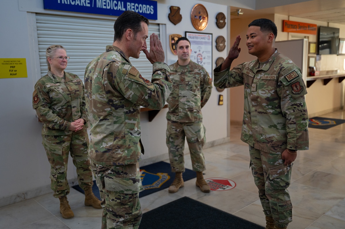 U.S. Air Force Maj. Gen. Paul Moga, Third Air Force commander, recognizes a superior performer, U.S. Air Force Senior Airman Carl Mata, an Airman assigned to the 39th Medical Group, at Incirlik Air Base, Türkiye, Oct. 3, 2024. The leadership team had a chance to meet with Airmen, observe ongoing operations and gain a better understanding of the challenges and successes of the wing’s mission. (U.S. Air Force photo by Staff Sgt. Suzie Plotnikov)