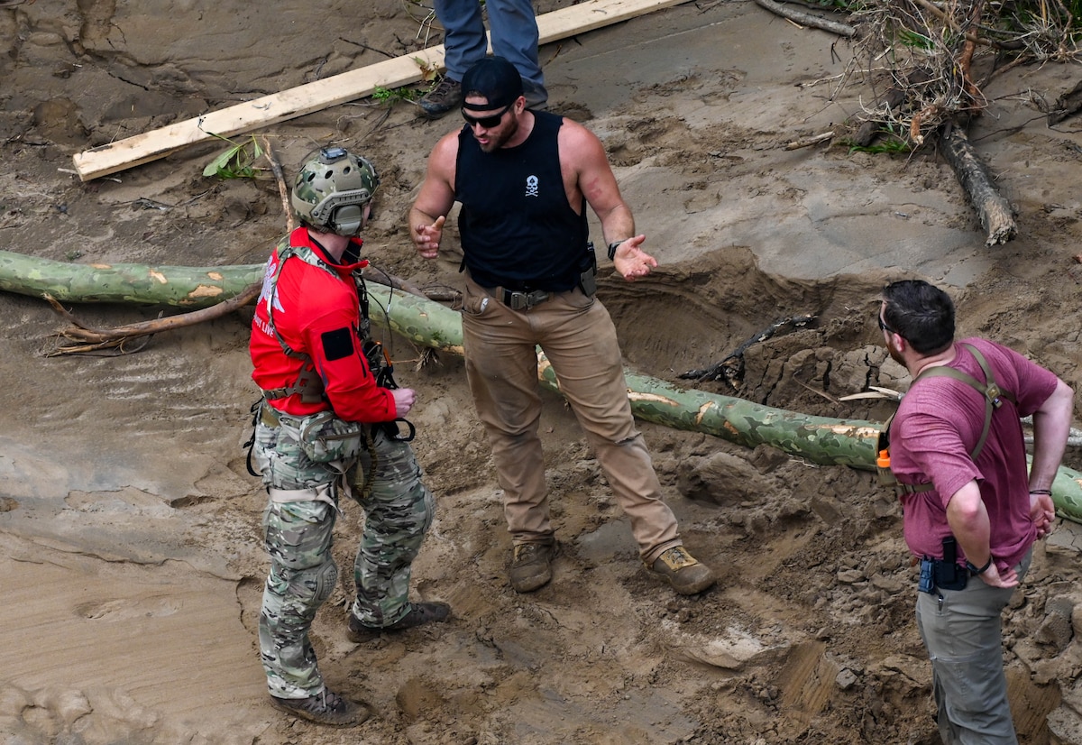 U.S. Air Force pararescuemen assigned to the 48th Rescue Squadron, forward deployed as the 563rd Personal Recovery Task Force, make contact with local civilians over various locations in North Carolina, Oct. 4, 2024, in support of the U.S. Northern Command and Air Forces Northern, Defense Support of Civil Authorities Disaster Relief mission. The 563rd PRTF provided the necessary support to aid local authorities following natural disasters when directed and approved by the Secretary of Defense. (U.S. Air Force video by Senior Airman Andrew Garavito)