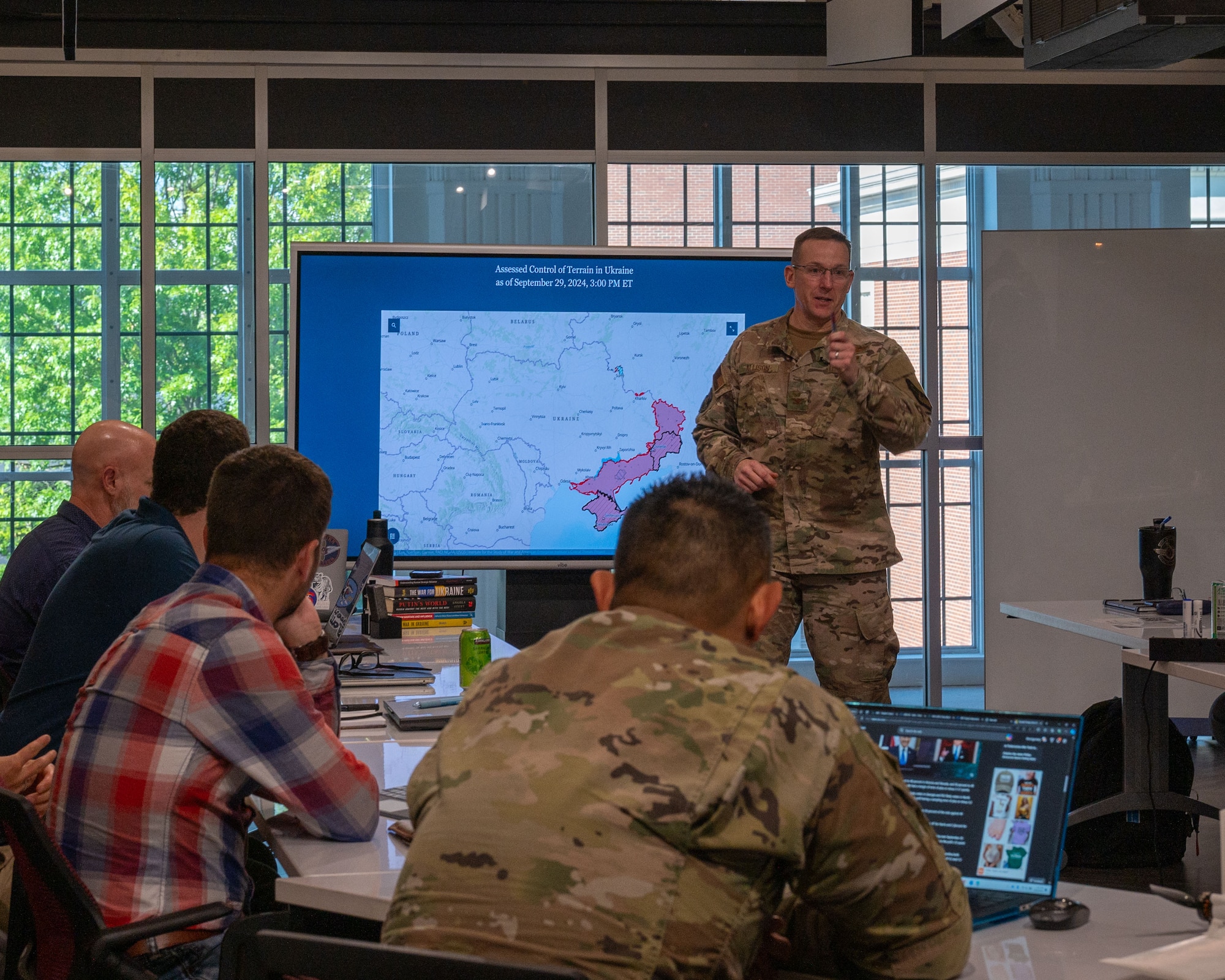 U.S. Air Force Col. Russell Allison, Air War College deputy director, gives a briefing to the Innovation Research Task Force students at Montgomery, Alabama, Oct. 2, 2024. Throughout the course, students will hear from military and private industry innovation leaders about how they approach problems, and how they develop and implement processes to accelerate innovation. (U.S. Air Force photo by Senior Airman Evan Lichtenhan)