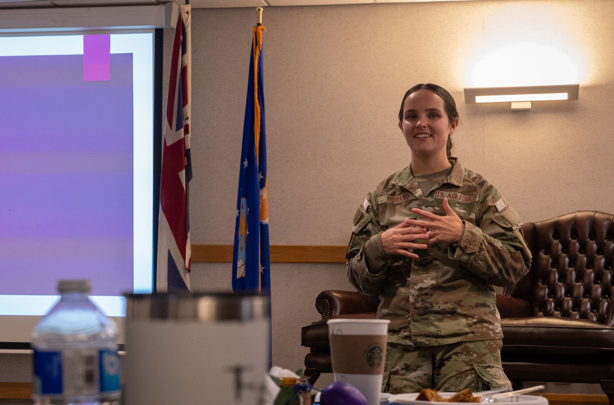 U.S. Air Force Capt. Megan Howard, 100th Air Refueling Wing chief of Wing Information Operations, speaks on behalf of the operational security team at Royal Air Force Mildenhall, England, Oct. 1, 2024.