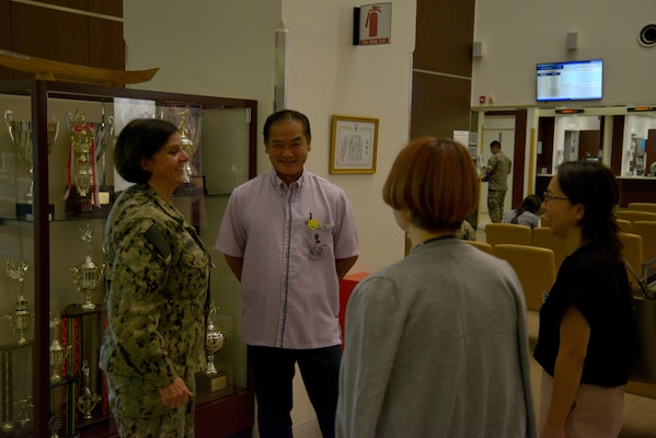 OKINAWA, Japan (Oct. 3, 2024) – Capt. Kathleen Cooperman, commanding officer, U.S. Navy Medicine Readiness and Training Command (NMRTC), left, met with the City of Ginowan Mayor Mr. Atsushi Sakima, center, Oct. 3, 2024. (U.S.  Navy photo by Mass Communication Specialist 2nd Class Trey Fowler)