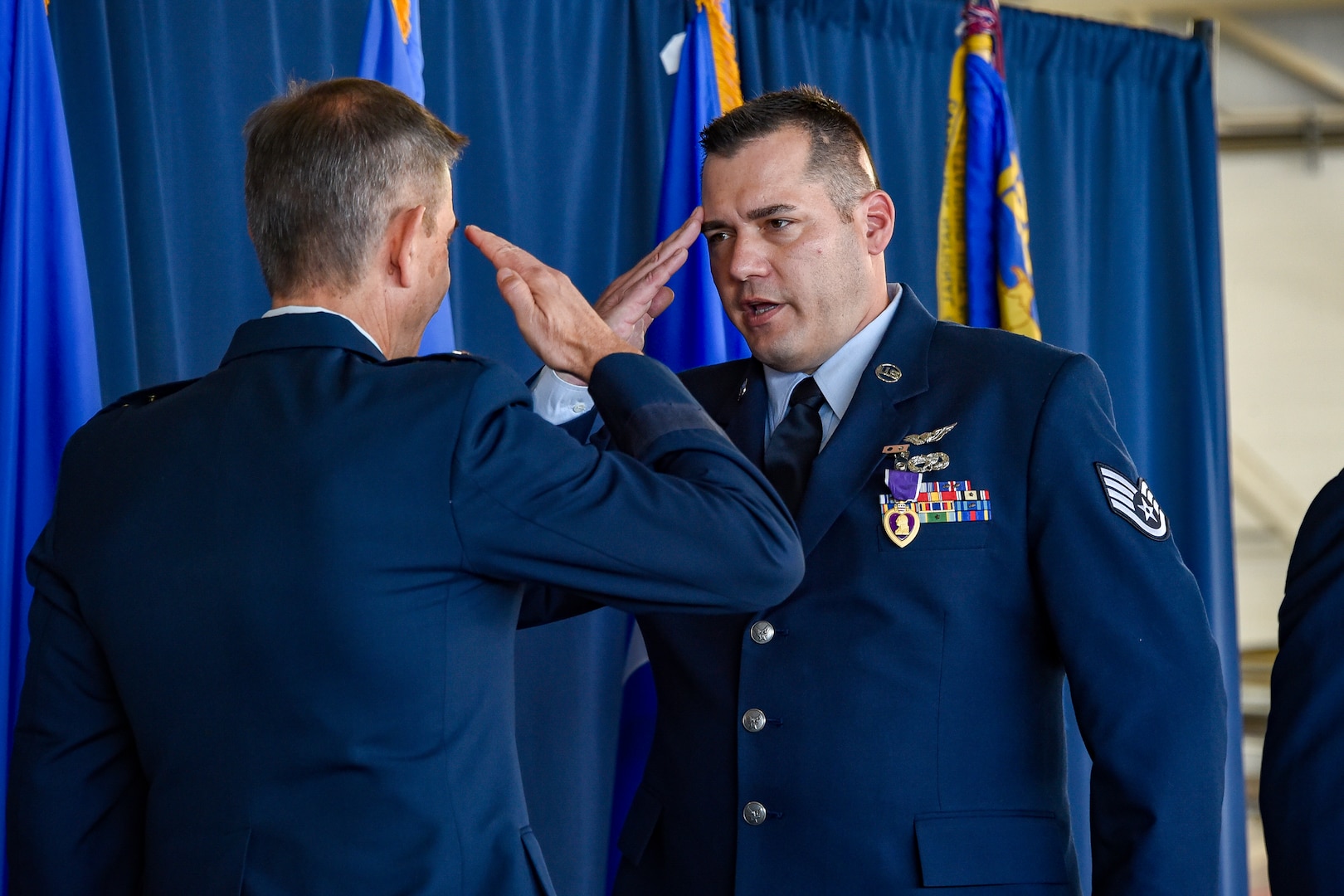 U.S. Air Force Staff Sgt. Dustin Dinkelacker, assigned to the 129th Maintenance Squadron, 129th Rescue Wing, is awarded the Purple Heart medal at Moffett Air National Guard Base, Calif., Oct. 5, 2024. Introduced as the "Badge of Military Merit" by Gen. George Washington in 1782, the Purple Heart is the nation's oldest military award.