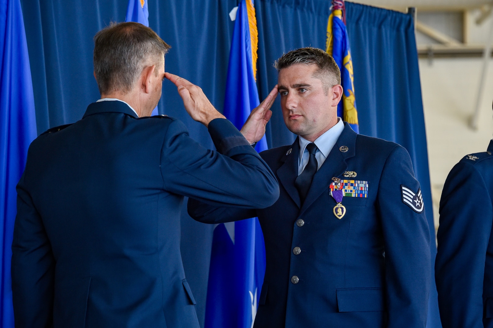 U.S. Air Force Staff Sgt. Michael Byrne, assigned to the 129th Maintenance Squadron, 129th Rescue Wing, is awarded the Purple Heart medal at Moffett Air National Guard Base, Calif., Oct. 5, 2024, for his actions in Jordan following the Tower 22 atttack.