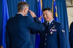 U.S. Air Force Senior Airman Herland Antezana, assigned to the 129th Maintenance Squadron, 129th Rescue Wing, is awarded the Purple Heart medal at Moffett Air National Guard Base, Calif., Oct. 5, 2024. He was one of three California Air National Guard Airmen to receive the Purple Heart for their actions following the January attack on Tower 22 in Jordan.