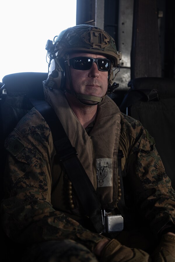 U.S. Marine Corps Lt. Col. Stephen G. Page, commanding officer of Combat Logistics Battalion 24, 24th Marine Expeditionary Unit (MEU) Special Operations Capable (SOC), rides in a CH-53E Super Stallion with Marine Medium Tiltrotor Squadron 365 (Reinforced), 24th MEU (SOC) over the Mediterranean Sea, Sept. 29, 2024. The Wasp (WSP) Amphibious Ready Group and embarked 24th MEU (SOC) are conducting operations in the U.S. Naval Forces Europe and Africa area of operations on a scheduled deployment. The WSP ARG-24th MEU (SOC) is supporting U.S., Allied and partner interests in the region, including in the Eastern Mediterranean Sea, to continue promoting regional stability and deterring aggression. (U.S. Marine Corps photo by Cpl. Ryan Ramsammy)