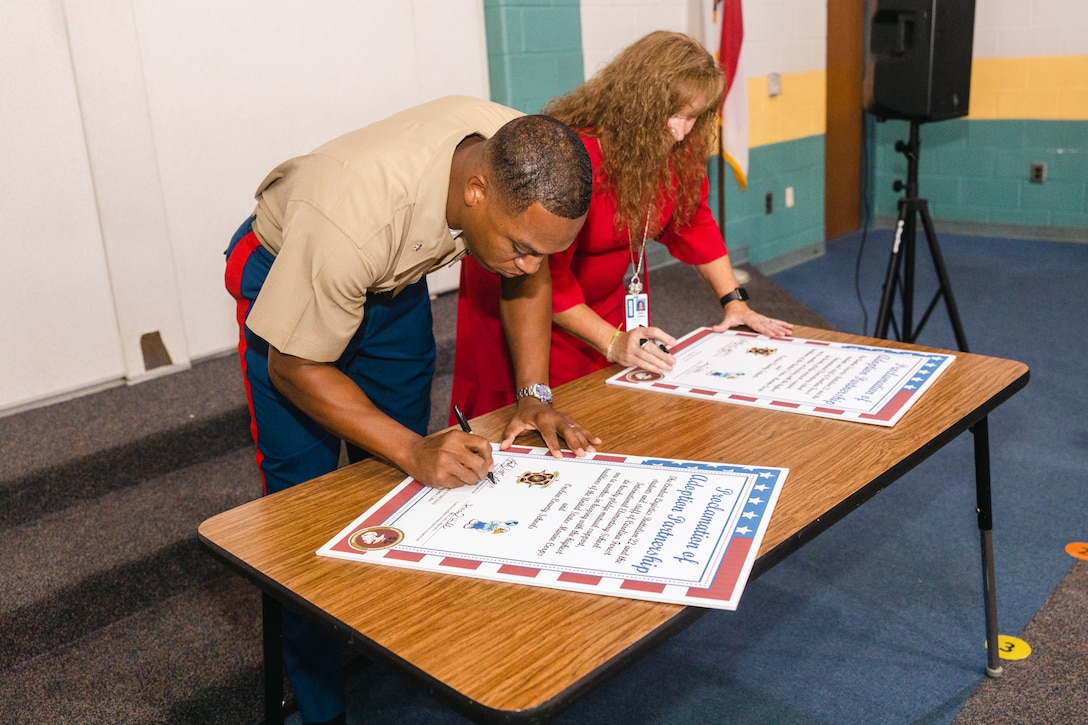 CLB-22 Participates in an Adopt-A-School Event