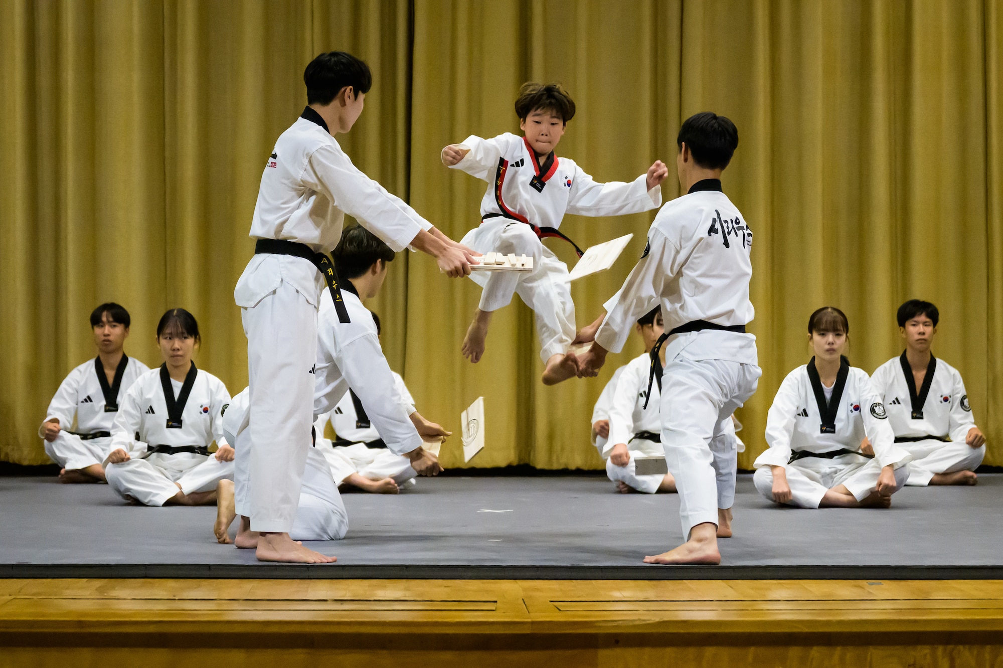 The South Korean Taekwondo team performs a demonstration at Hill Air Force Base, Utah, Oct. 10, 2024. The event celebrated the 71-year alliance between the United States and South Korea, marked by Utah Governor Spencer Cox declaring Oct. 12, 2024, as Utah Korea-U.S. Alliance Day. The team demonstrated their martial arts skills for the audience. (U.S. Air Force photo by R. Nial Bradshaw)