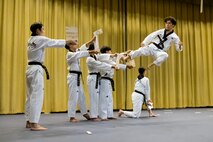 The South Korean Taekwondo team performs a demonstration at Hill Air Force Base, Utah, Oct. 10, 2024. The event celebrated the 71-year alliance between the United States and South Korea, marked by Utah Governor Spencer Cox declaring Oct. 12, 2024, as Utah Korea-U.S. Alliance Day. The team demonstrated their martial arts skills for the audience. (U.S. Air Force photo by R. Nial Bradshaw)