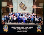 Attendee of fuel forum pose for group photo.