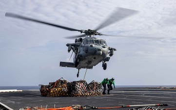 USS Harry S. Truman (CVN 75)  replenishes in the Atlantic Ocean.