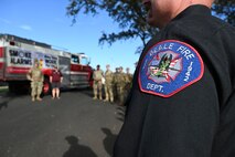Beale Air Force Base firefighters gather during the kickoff of Fire Prevention Week at Beale AFB, California, Oct. 6, 2024.