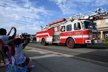 Beale's first responders perform a parade of vehicles around base housing with their sirens blaring to kick off Fire Prevention Week at Beale Air Force Base, California, Oct. 6, 2024.