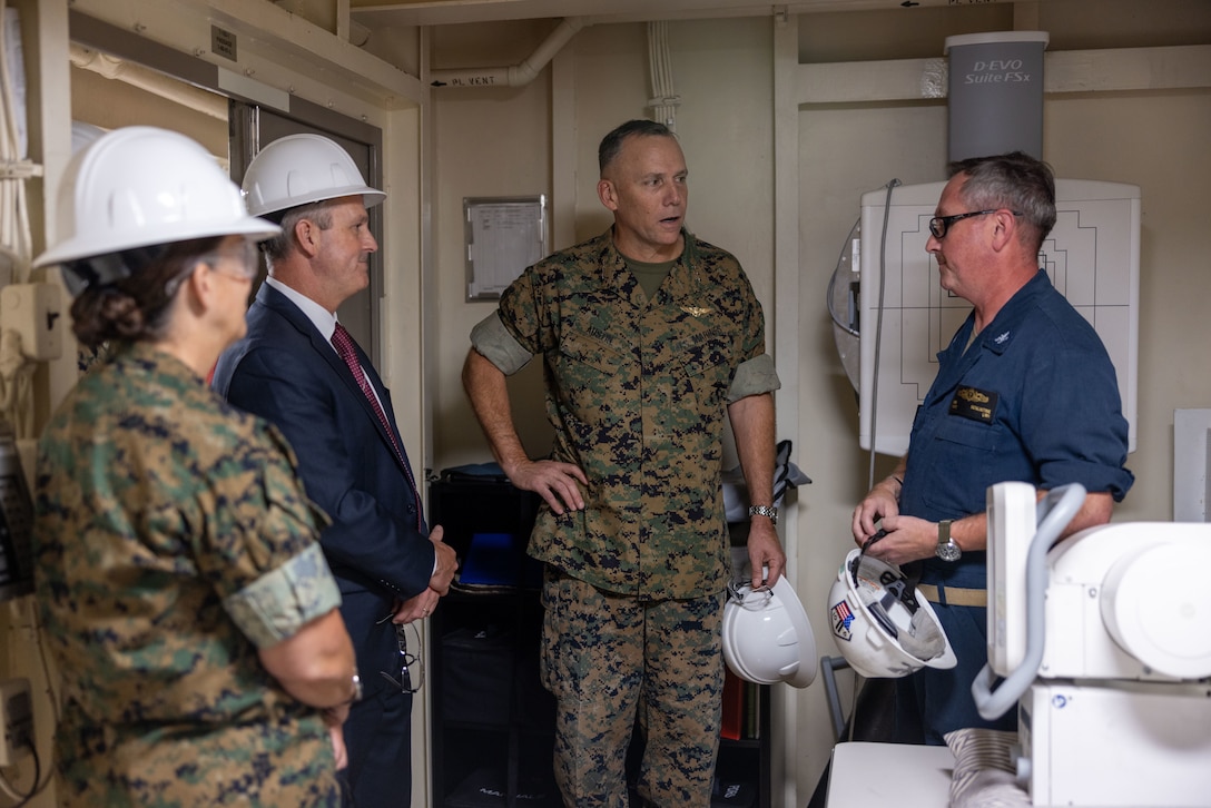 Commander, Marine Corps Forces Command, Lt. Gen. Bobbi Shea, hosts Lt. Gen. Eric Austin’s visit to the USS Arlington (LPD 24), a San Antonio-class amphibious transport dock and one of three warships comprising the Kearsarge Amphibious Ready Group (ARG), on October 4, 2024, in Norfolk, Virginia. Austin, the Deputy Commandant for Combat Development and Integration, engaged with the ship's crew and leadership to discuss embarked Marine Expeditionary Units (MEU) landing force’s critical requirement for the ship’s versatility, readiness, and combat capability. LPD-24 and amphibious warships of its class provide the Navy and Marine Corps team with modern, networked, and survivable sea-bases that operate with 21st century transformational landing craft required to deliver landing forces ashore and conduct expeditionary warfare missions. (U.S. Marine Corps photo by Staff Sgt. Servante R. Coba)