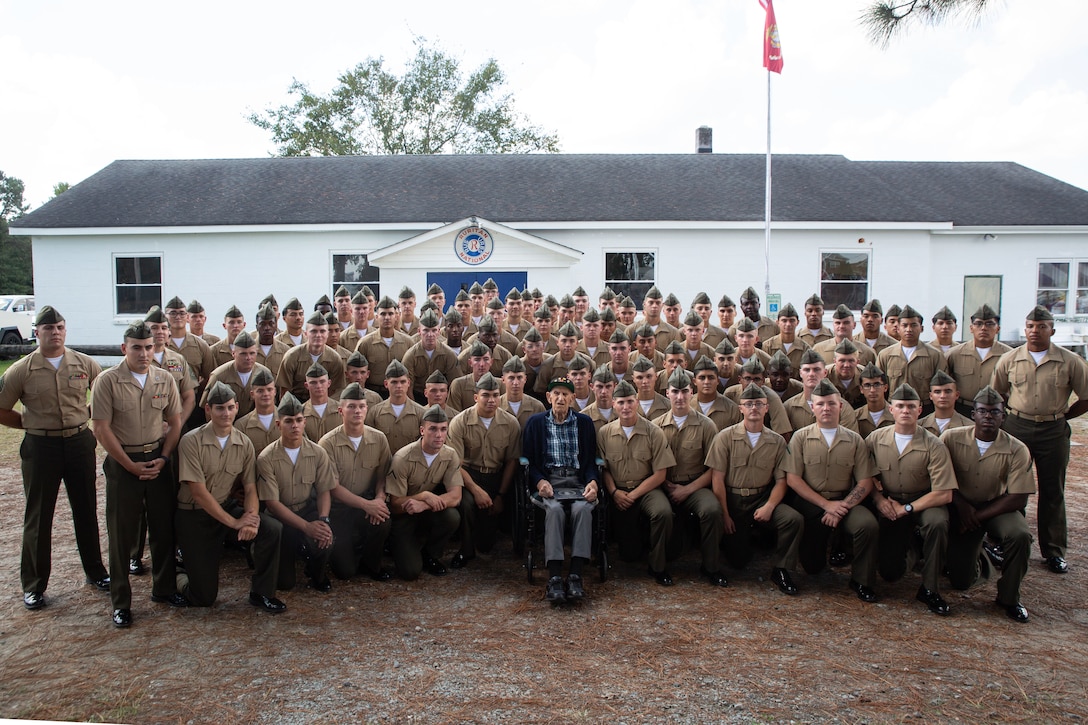 U.S. Marine Corps veteran, Cpl. Eddie Vincek, a WWII veteran and Battle of Iwo Jima survivor, poses for a group photo with Marines from Training Company , Marine Corps Security Forces Regiment during his 100th birthday celebration at the Ruritan Club, Chesapeake, Va., Sept. 29, 2024.

Vincek served with ‘A’ Company, 1st Battalion, 28th Marine Regiment, 5th Marine Division in the Battle of Iwo Jima which was one of the last and most violent struggles of the WWII campaign in the Pacific.

During the celebration, Vincek was joined by close family and friends and honored with a challenge coin and plaque.

 (U.S. Marine Corps photo taken by Lance Cpl. Catherine S. Verenzuela Mariano)