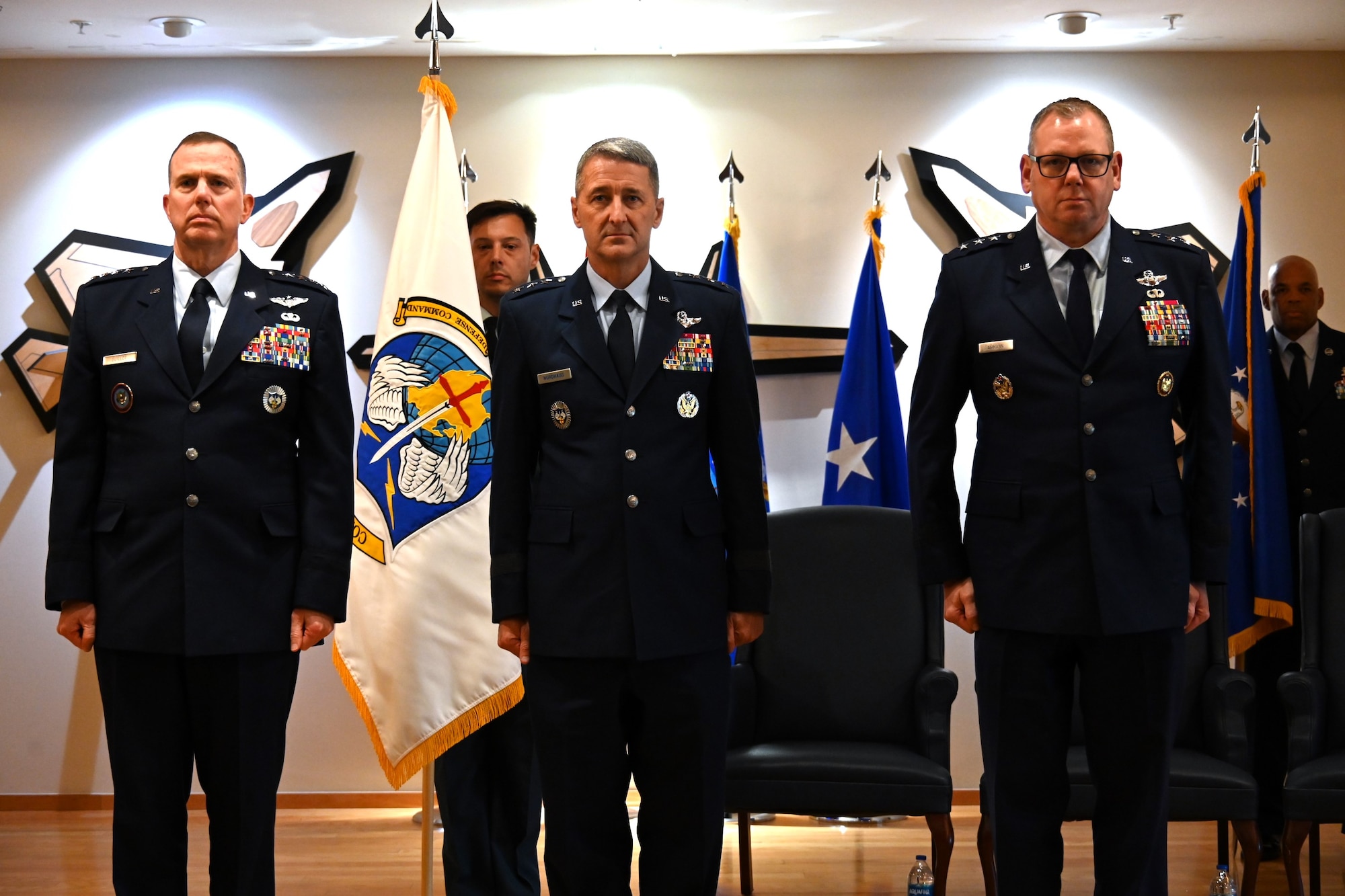 Change of Command for First Air Force. Images show the handoff from Lt. Gen. Steven Nordhaus to Lt. Gen. Luke Ahmann.