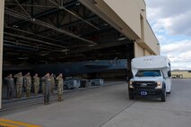 Team Minot Airmen assigned to the 5th Munitions Squadron greet and render a salute to U.S. Air Force Col. Jesse Lamarand, 5th Bomb Wing commander, and Congressional Staff Delegation (STAFFDEL) as they arrive for a B-52H Stratofortress static tour at Minot Air Force Base, North Dakota, Oct. 2, 2024. STAFFDELs are crucial because members of Congress frequently depend on their insights and recommendations when making decisions about key legislative matters. (U.S. Air Force photo by Airman 1st Class Luis Gomez)