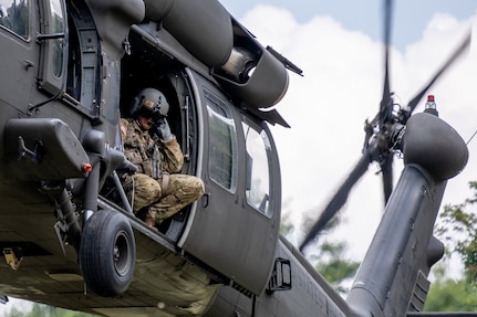 Virginia National Guard Soldiers assigned to the Lynchburg-based 1st Battalion, 116th Infantry Regiment, 116th Infantry Brigade Combat Team conduct air operations training on UH-60 Black Hawk helicopters with air crews assigned to the Sandston-based 2nd Battalion, 224th Aviation Regiment, 29th Infantry Division July 10, 2021, in Pulaski, Virginia. Soldiers who recently graduated from Air Assault and Pathfinder Schools passed along their newly-acquired skills to help build operational knowledge within the unit. (U.S. Army National Guard photo by Spc. Ritah Daniel)