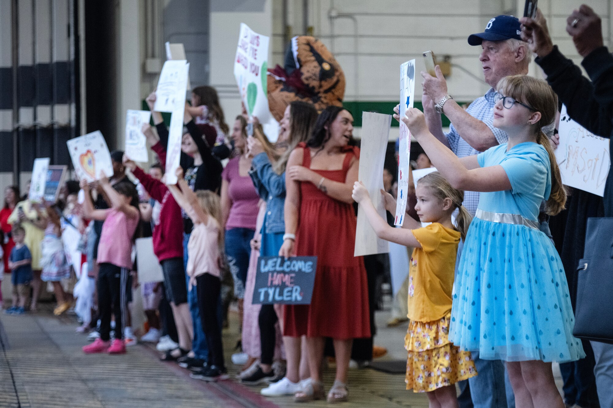 Family and friends wait to welcome back return deployers at Seymour Johnson Air Force Base.
