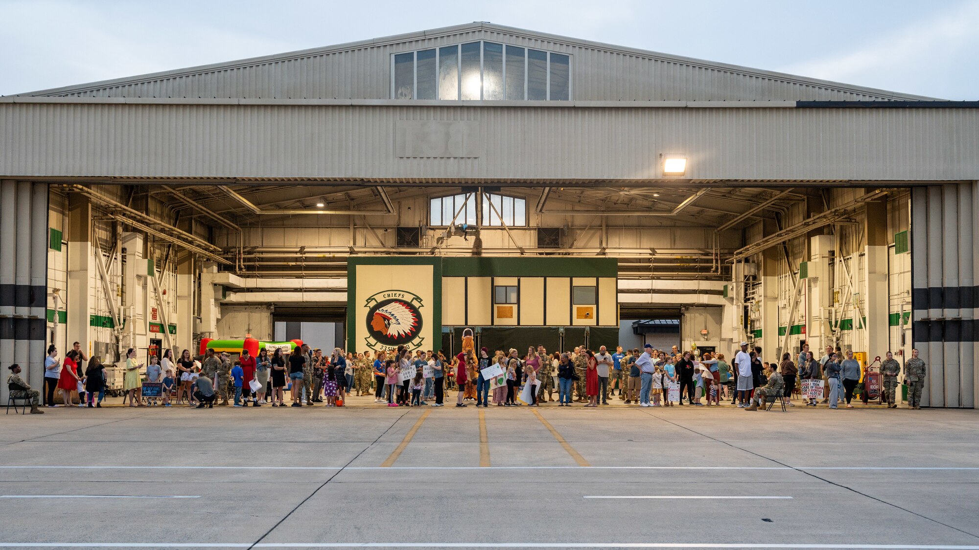 Family and friends wait to welcome back return deployers.