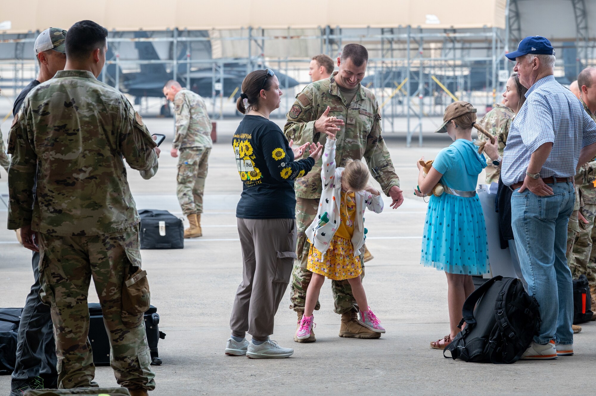 U.S. Air Force Airmen reunite with family and friends after returning from a deployment.