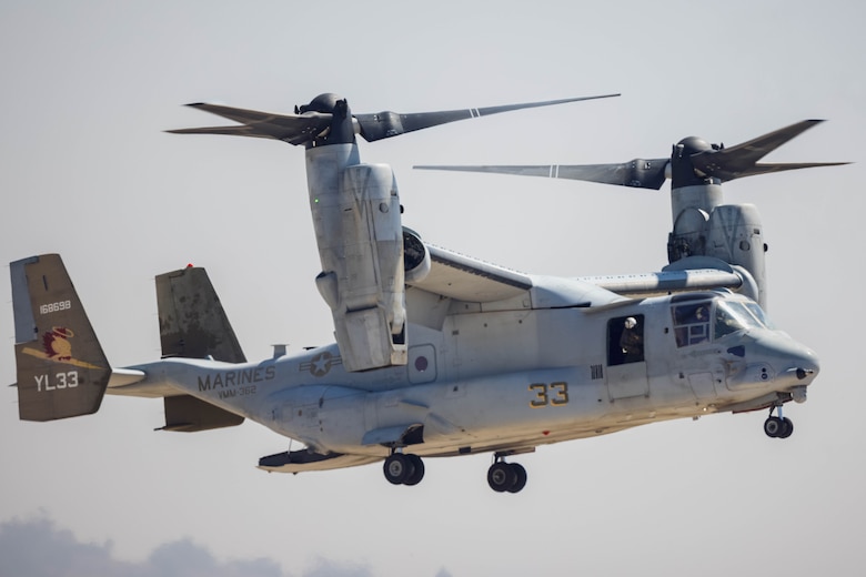 A U.S. Marine Corps MV-22B Osprey assigned to Marine Medium Tiltrotor Squadron (VMM) 362, Marine Aircraft Group 16, 3rd Marine Aircraft Wing, flies above the flight line during the Marine Air-Ground Task Force demonstration of the 2024 Marine Corps Air Station Miramar Airshow in San Diego, Sept. 27, 2024. The MAGTF Demo displays the coordinated use of close-air support, armor, artillery and infantry forces and provides a visual representation of how the Marine Corps operates. America's Airshow 2024 is a unique and incredible opportunity to witness Marine and joint aviation capabilities, civilian performers, and the world-famous Blue Angels; to interact first-hand with Marines, other service members, and first responders; and to see first-hand the innovative spirit of the Marine Corps through emerging technologies and forward-thinking. (U.S. Marine Corps photo by Ezekieljay Correa)