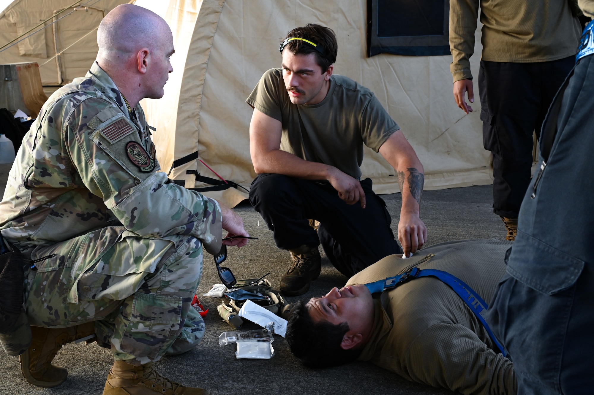 Airmen training Tactical Combat Casualty Care.
