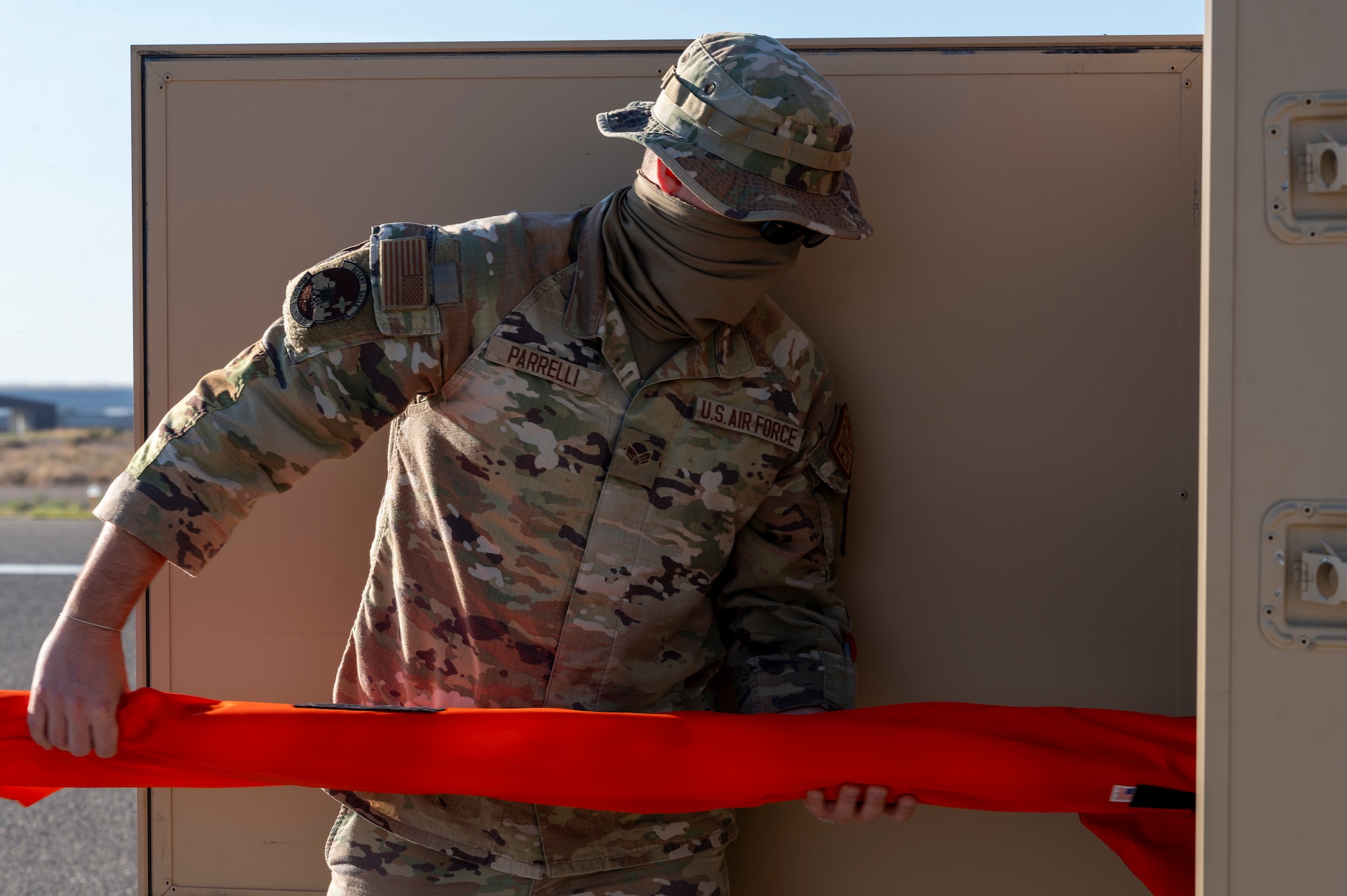 U.S. Air Force Senior Airman Hayes Parrelli, 49th Civil Engineer Squadron execution support technician, helps set up markers on a runway during Operation TRAILBLAZER at Holloman Air Force Base, New Mexico, Oct. 1, 2024.