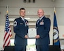 Lt. Col. Josh Ketterer, right, commander of the 165th Airlift Squadron, presents a Certificate of Retirement to Chief Master Sgt. Bradley Simms, a loadmaster and the squadron’s senior enlisted leader, during Simms’ retirement ceremony at the Kentucky Air National Guard Base in Louisville, Ky., July 20, 2024. Simms retired from the 123rd Airlift Wing after more than 27 years in the military. (U.S. Air National Guard photo by Airman 1st Class Annaliese Billings)