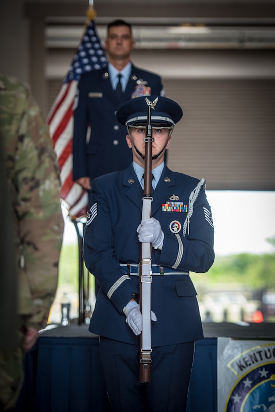 The 123rd Airlift Wing Color Guard presents the colors during the retirement ceremony of Chief Master Sgt. Bradley Simms at the Kentucky Air National Guard Base in Louisville, Ky., July 20, 2024. Simms, a loadmaster and senior enlisted leader for the 165th Airlift Squadron, retired after 27 years of military service. (U.S. Air National Guard photo by Airman 1st Class Annaliese Billings)