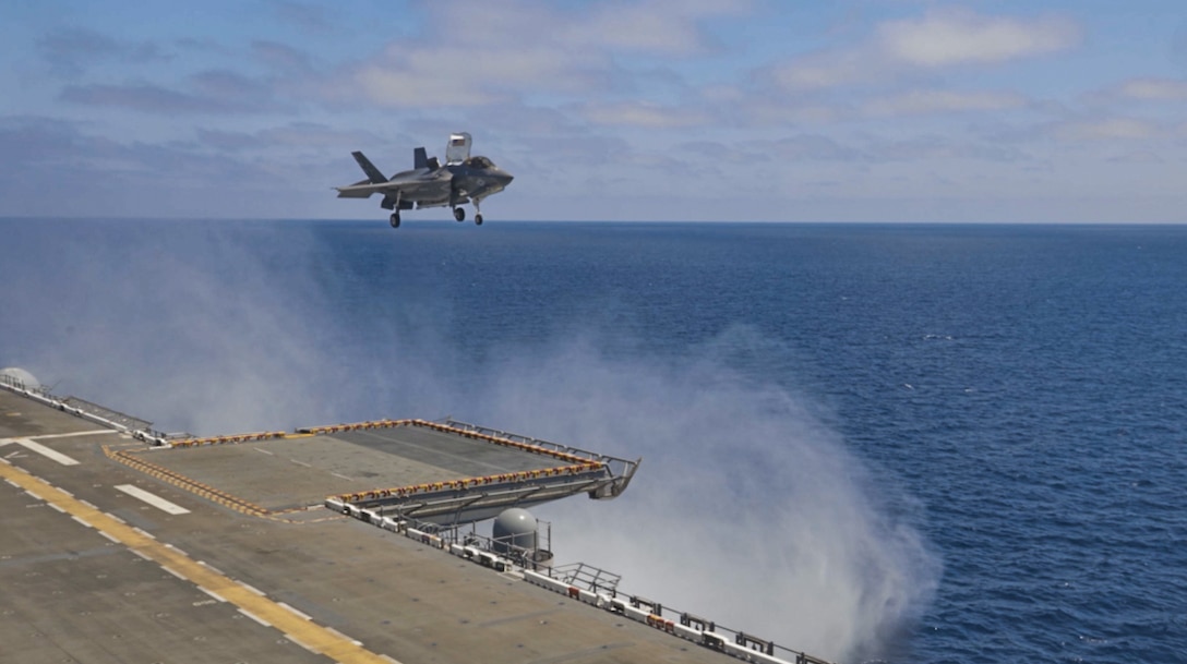U.S. Marine Corps F-35B Lightning II aircraft assigned to Marine Fighter Attack Squadron (VMFA) 211, Marine Aircraft Group 13, 3rd Marine Aircraft Wing, conduct flight deck qualifications aboard the amphibious assault ship USS Tripoli (LHA 7) while underway in the Pacific Ocean, July 15, 2024. Joint training between 3rd MAW squadrons and the Tripoli in the U.S. 3rd Fleet area of operations enabled the amphibious assault ship to conduct Mobility Air Qualifications and 3rd MAW squadrons to maintain currency required for amphibious operations.