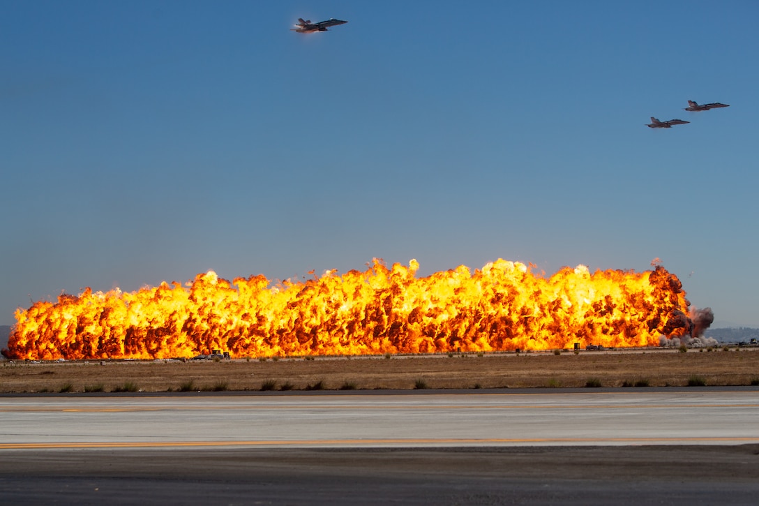 U.S. Marine Corps F/A-18 Hornets assigned to Marine Aircraft Group 11, 3rd Marine Aircraft Wing, I Marine Expeditionary Force conduct a simulated airstrike during the Marine Air-Ground Task Force demonstration at the 2024 Marine Corps Air Station Miramar Airshow in San Diego, Sept. 28, 2024. The MAGTF Demo displays the coordinated use of close-air support, armor, artillery, and infantry forces and provides a visual representation of how the Marine Corps operates. America's Airshow 2024 is a unique and incredible opportunity to witness Marine and joint aviation capabilities, civilian performers, and the world-famous Blue Angels; to interact first-hand with Marines, other service members, and first responders; and to see first-hand the innovative spirit of the Marine Corps through emerging technologies and forward-thinking. (U.S. Marine Corps photo by Cpl. Arthur W. Shores)