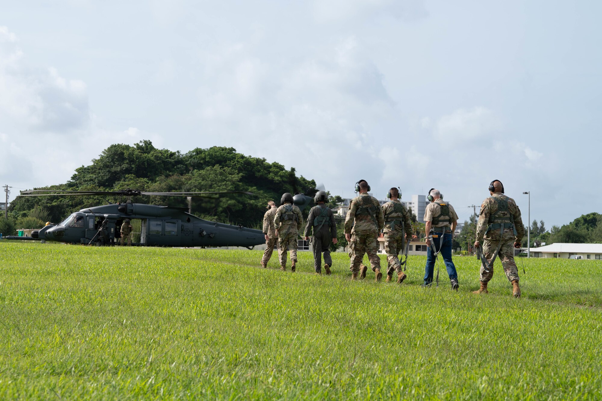 18th Wing and 5th AF leadership stepping towards a HH-60W